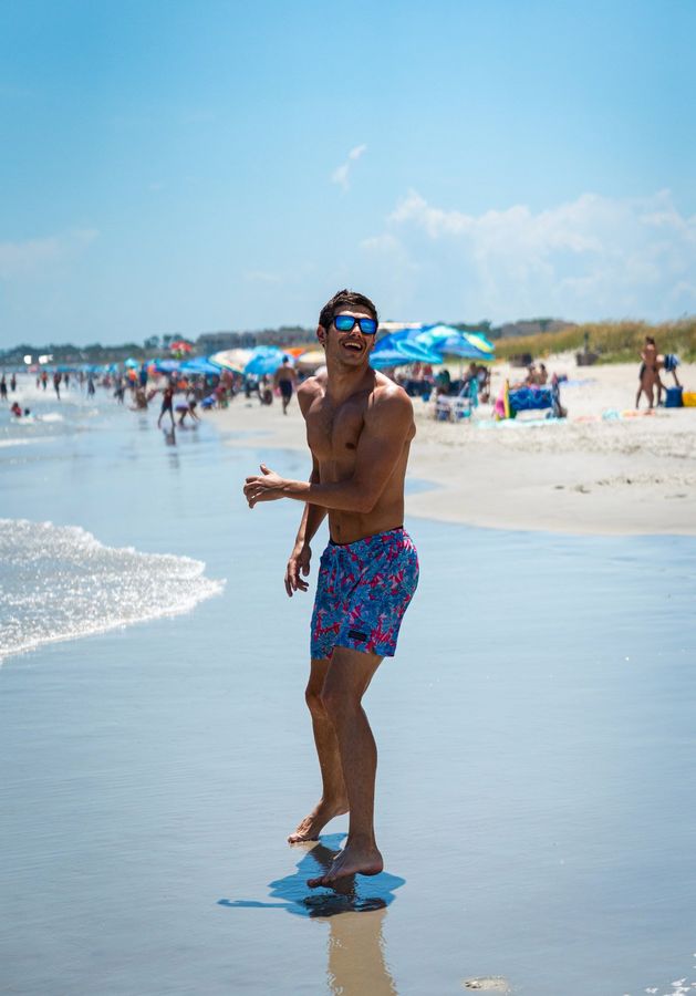 Man laughing on beach at Hilton Head
