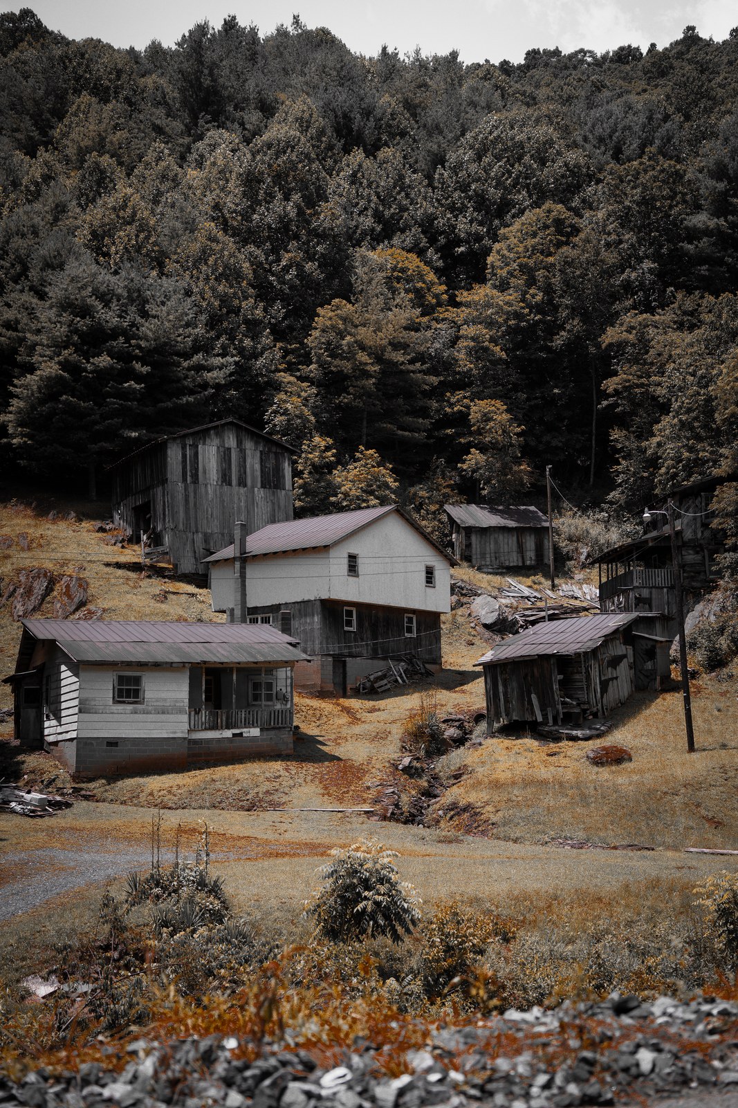 Abandoned houses on hillside mountain landscape